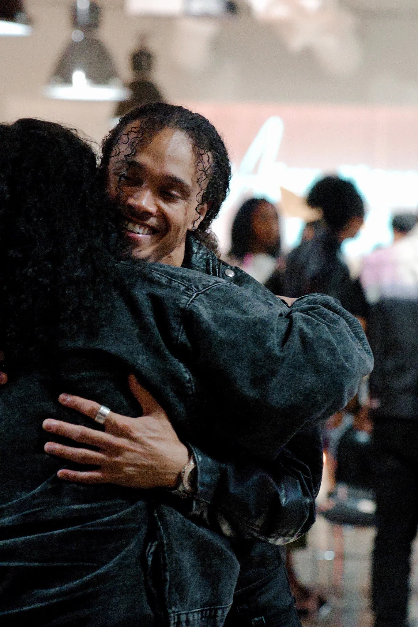 Dana Vaughns greeting someone after a live event